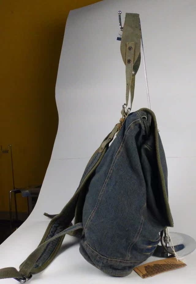Original Distressed Denim Backpack with Buckle Strap and Patch Details - Rugged and Stylish Design, Ideal for Daily Wear and Travel for Unisex