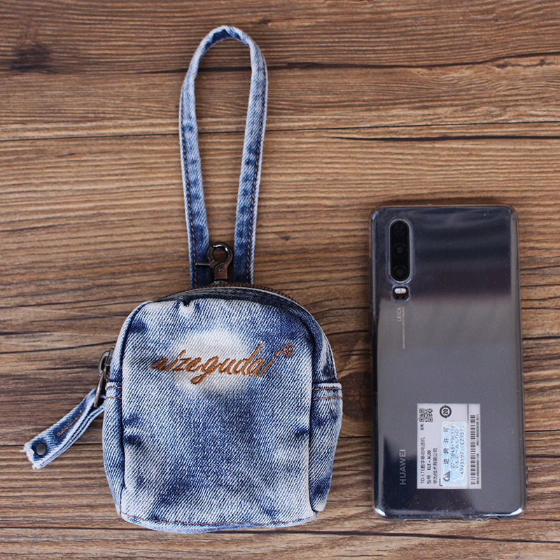 Trendy Denim Mini Backpack with Light Blue Washed Denim and Embroidered Text Detail - Compact, Functional Design, Ideal for Casual Outings, Travel, and Everyday Carry for Men