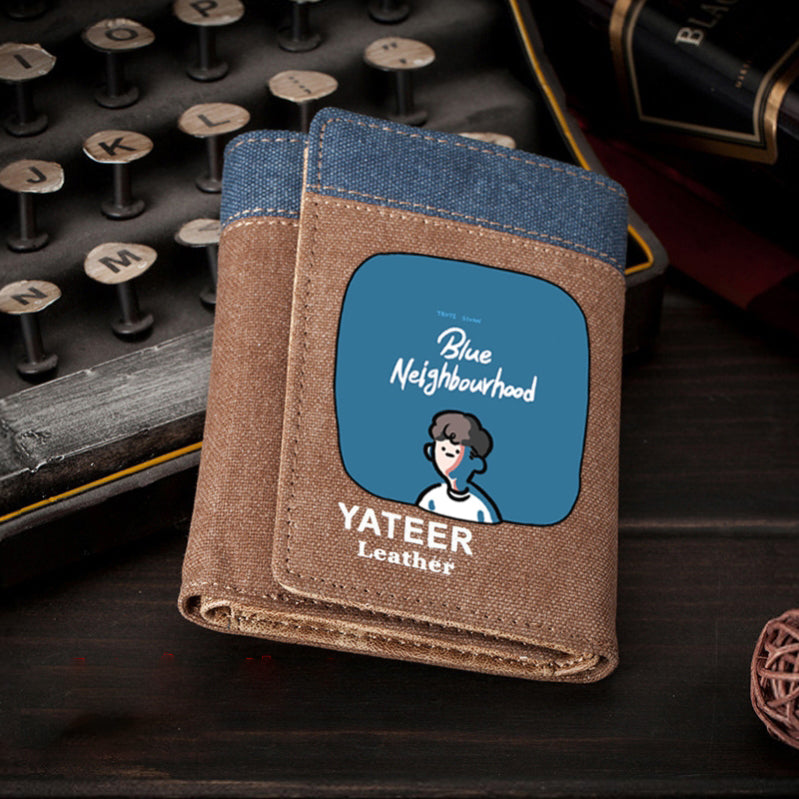 Original Blue Denim Wallet with Tan Leather Accents and Cartoon Logo - Casual, Trendy Design, Durable and Stylish for Casual Outings, Everyday Use, and Fashion-Forward Looks  for Men